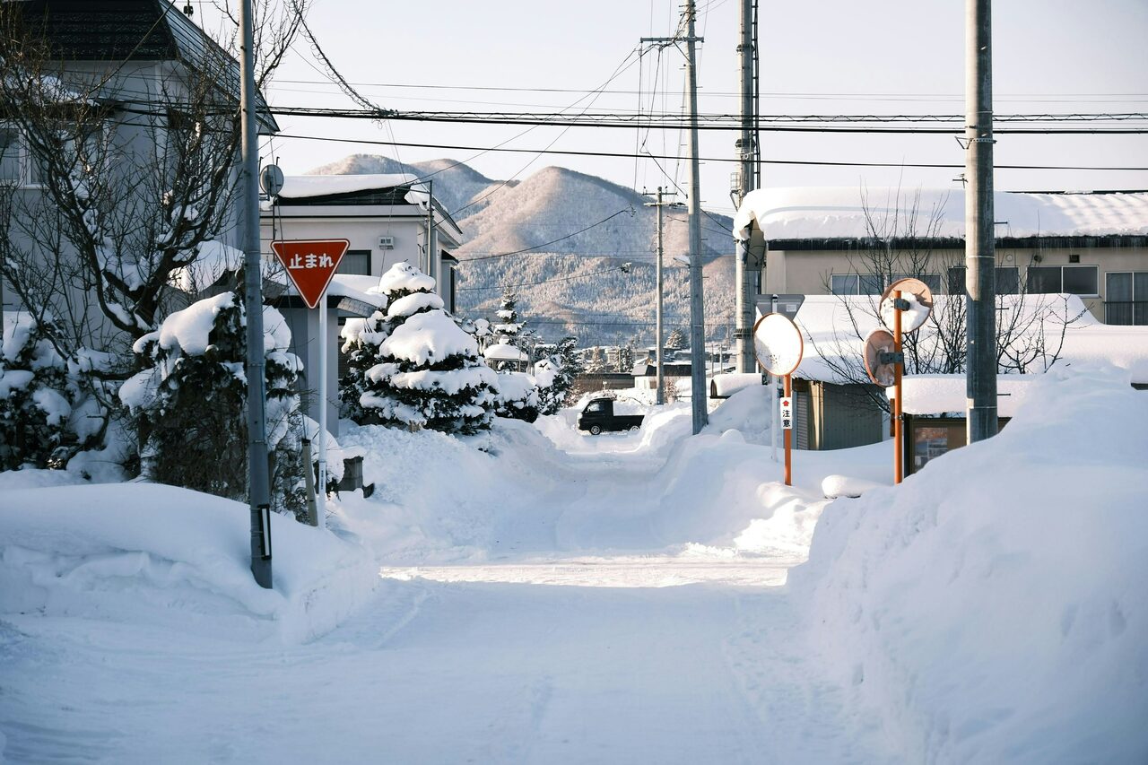 Snow covered street Hirosaki Aomori Japan seiya maeda unsplash