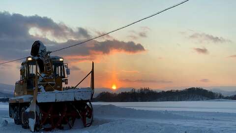 Snowclearing sunset