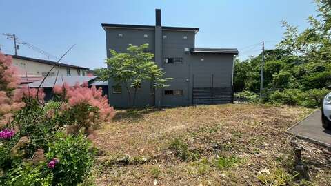 Empty land next to the house
